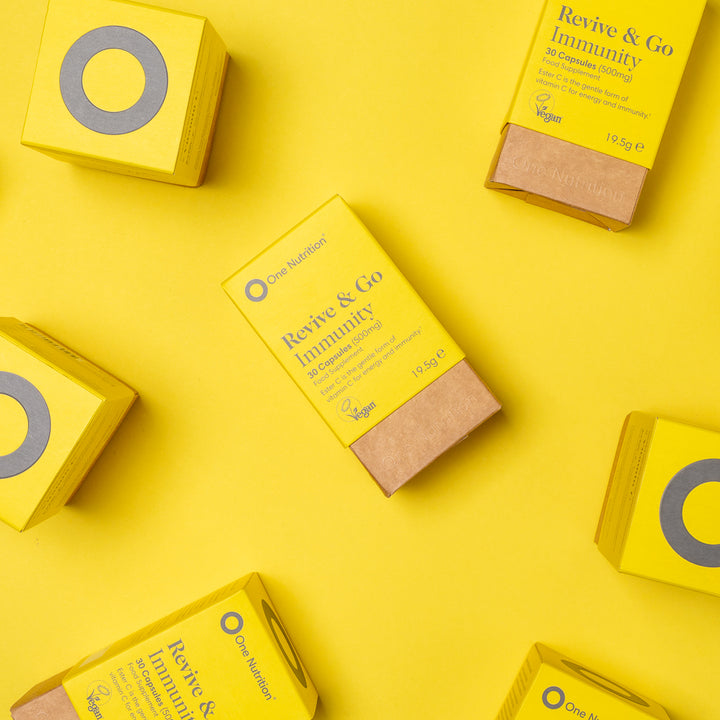Yellow boxes of 'Revive & Go Immunity' on a yellow background