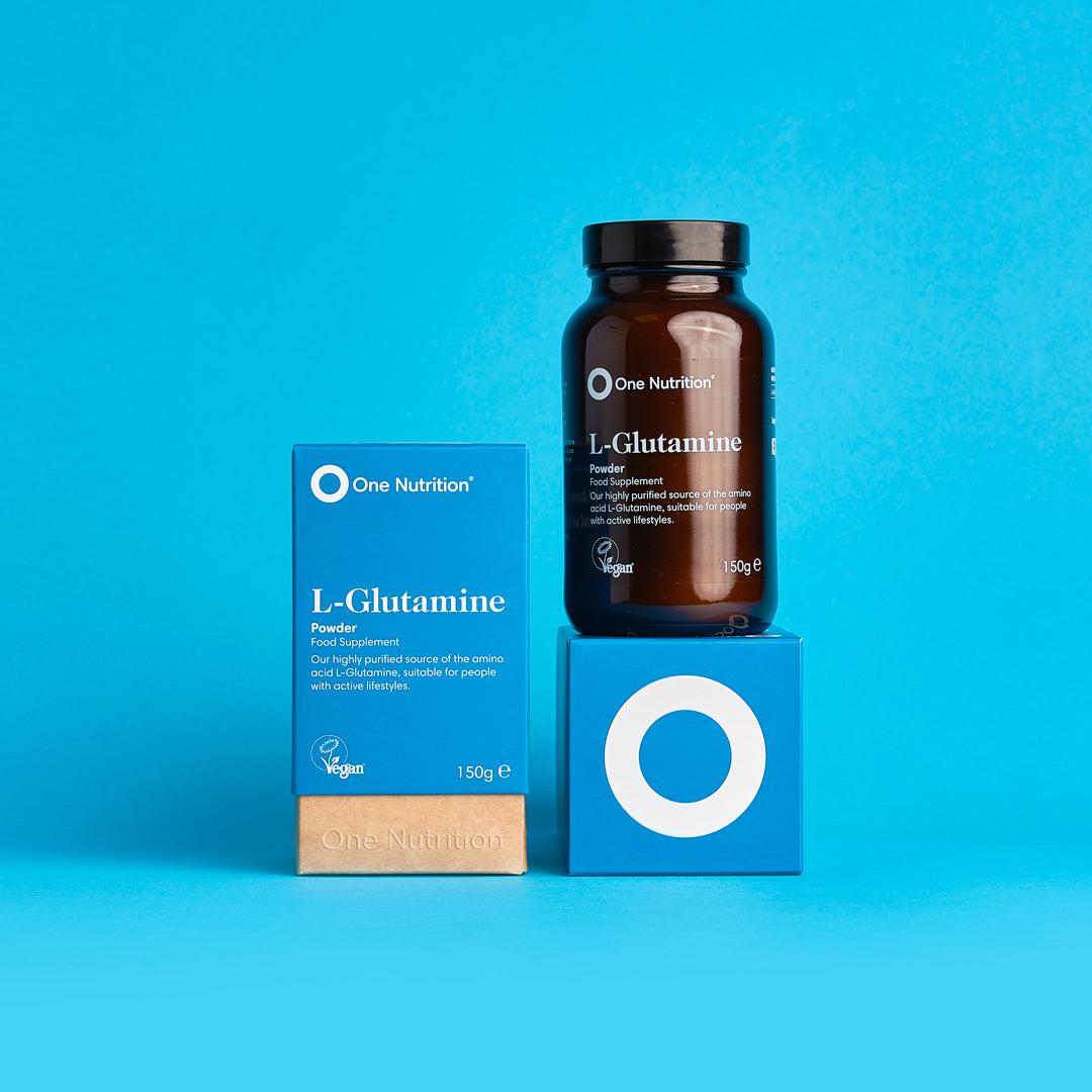 One Nutrition L-Glutamine powder and supplement bottle on a blue background