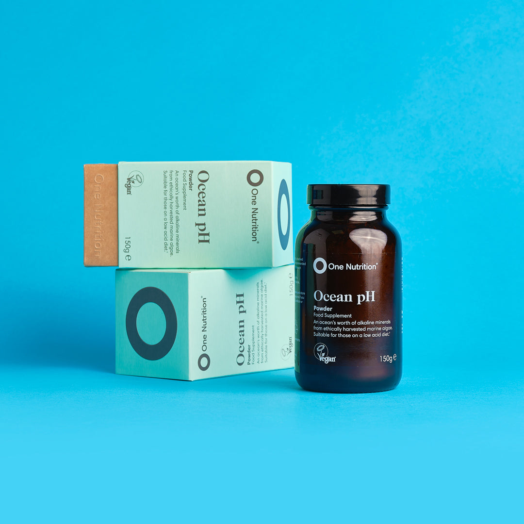 One Nutrition Ocean pH product and packaging on a blue background