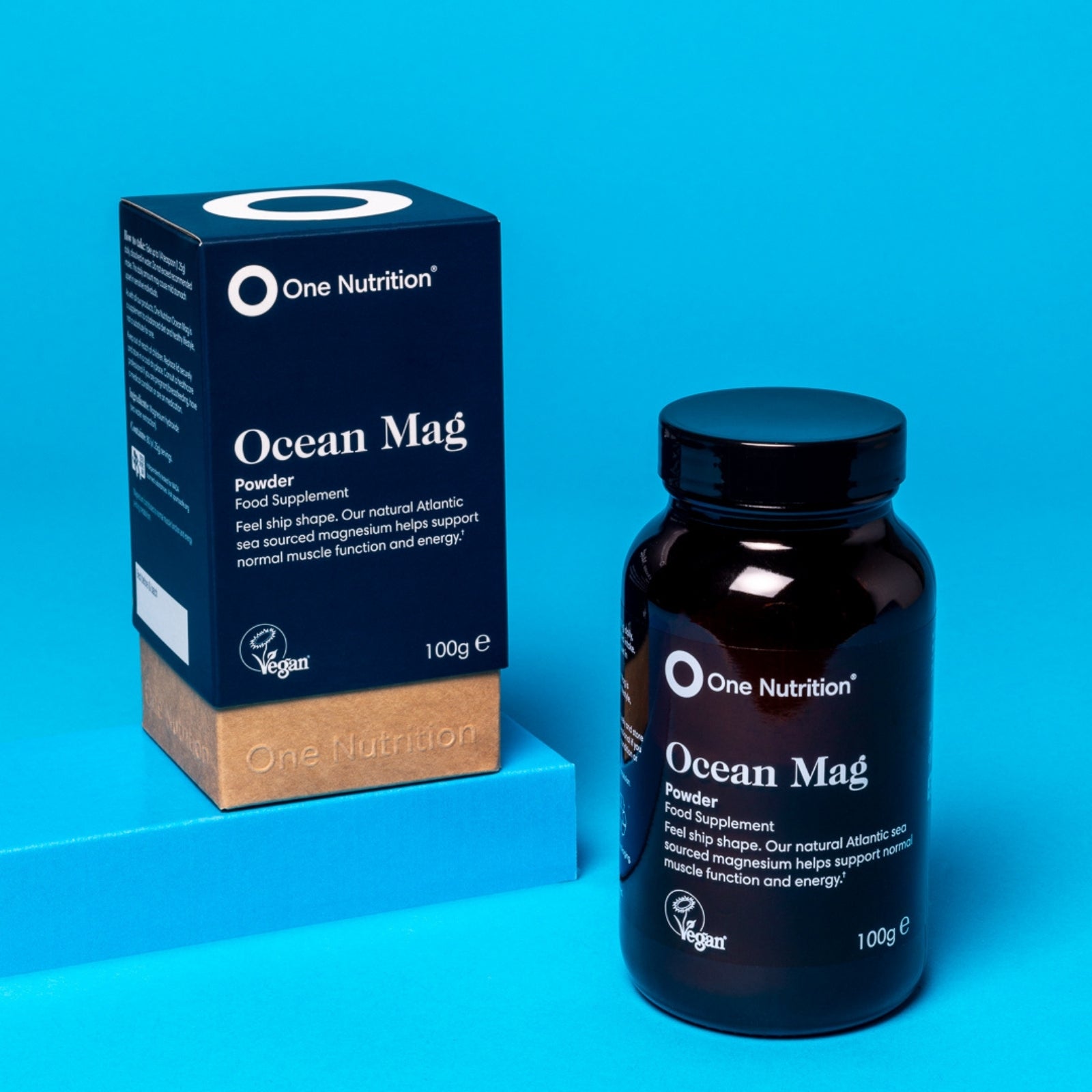 One Nutrition Ocean Mag supplement bottle and packaging on a blue background